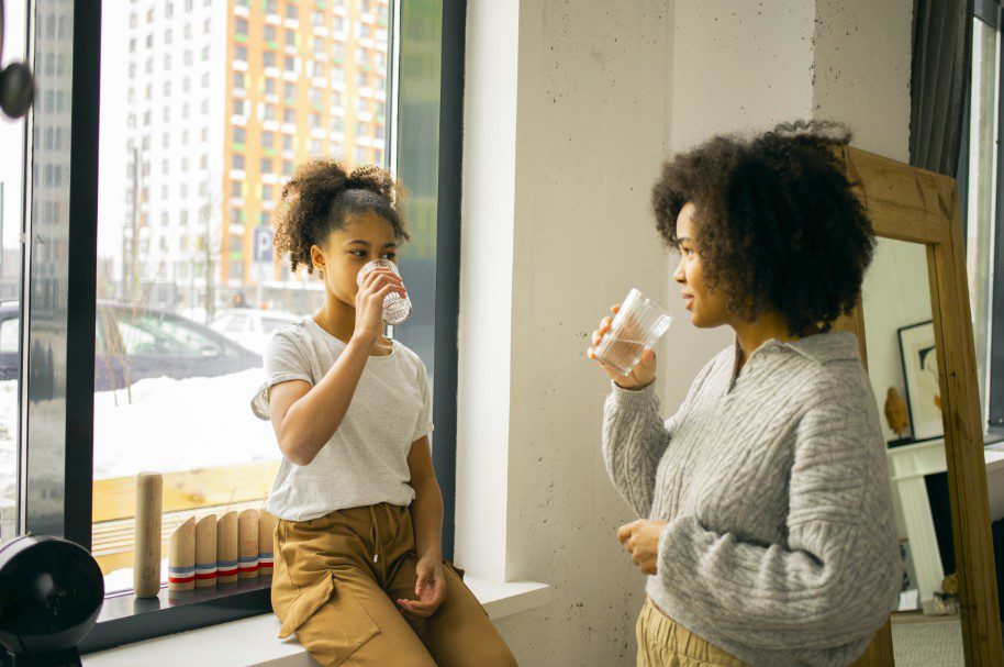 family drinking water